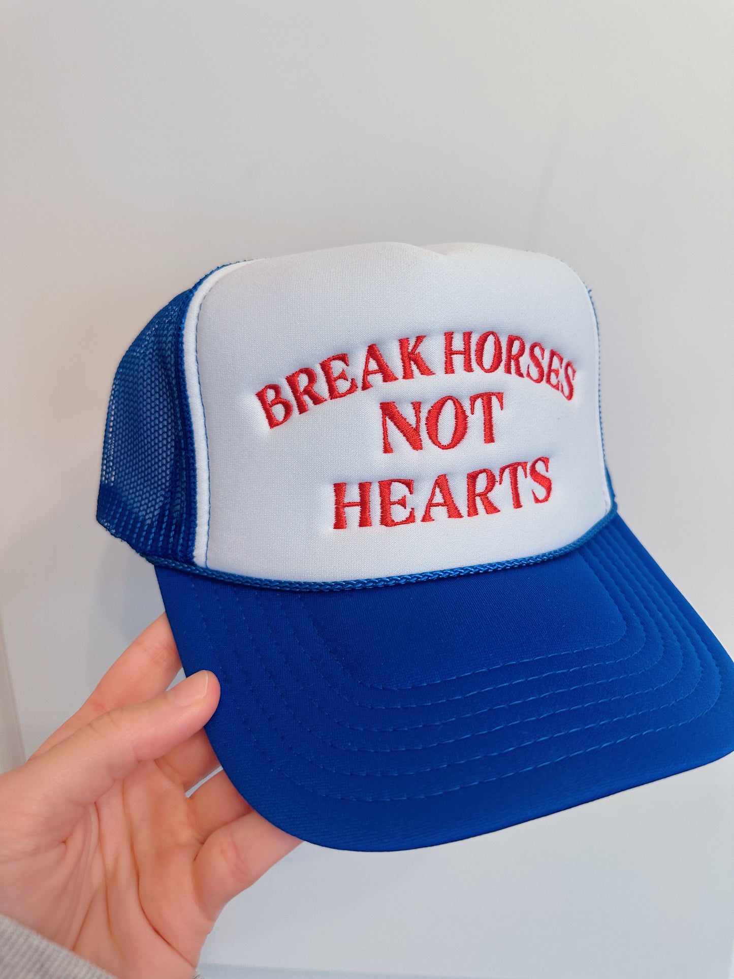 Break Horses Not Hearts Blue Trucker Hats